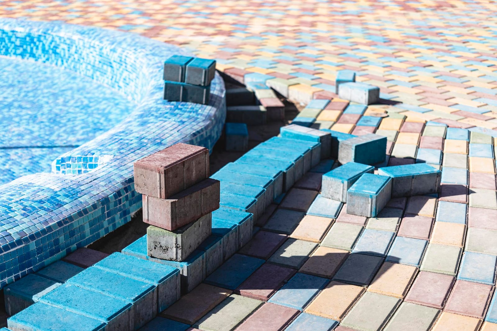 Mesh safety cover fitted across a rectangular family pool